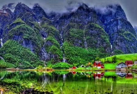 Amazing reflection - calm, summer, cabin, amazing, reflection, mountain, shore, view, mist, cliffs, lake, nice, emerald, houses, cottage, sky, clouds, greenery, beautiful, mirrored, slope, lovely, peaks, lakeshore, village, colorful, nature, clear