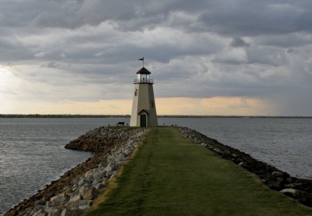 lonely lighthouse on the jetty - clouds, sea, jetty, lighthouse