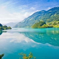lakeside village by a mountain