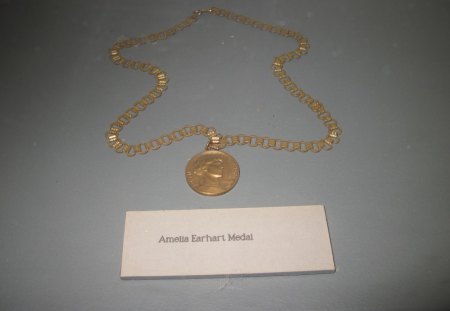 Amelia Earhart Gold Medal at the museum - medal, white, museum, Fantasy, gold