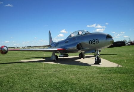 Airplane at the museum Alberta 27 - clouds, airplane, blue, Military, grass, black, white, silver, green, sky