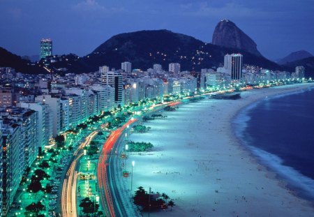 night beach in a city - city, water, beach, lights