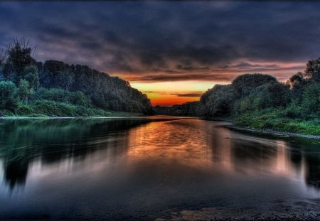 reflected sunset - trees, water, sun, clouds