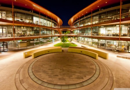 friday evening at an office park - courtyard, offices, buildings, lights