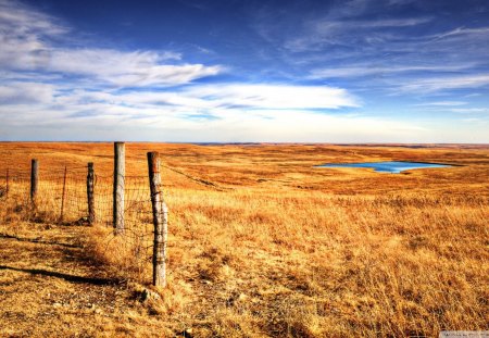 pond on flint hill kansas - sky, pond, hill, fence, fields