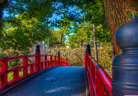 okazaki castle bridge japan hdr - red rails, trees, stone wall, bridge