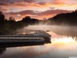 docks on misty lake