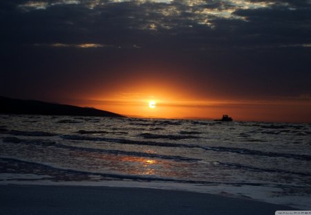 boat on urmia lake in turkey at dusk - lake, sundown, waves, boat