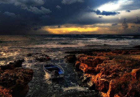 a storm at sea - water, boat, clouds, light