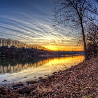 sunset on a river in autumn hdr