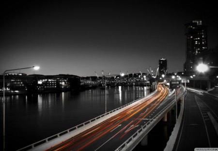 light traces on highway - river, highway, city, lights