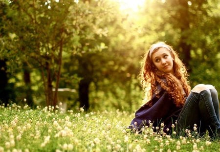 In nature - sunshine, stare, curly hair, trees, sun, lovely girl, face, nature, flowers, grass, cute