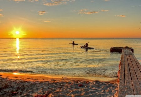 sea kayaking to the sun - kayaks, sunset, beach, sea, dock