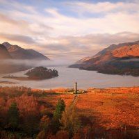 Lighthouse Monument in Autumn Landscape