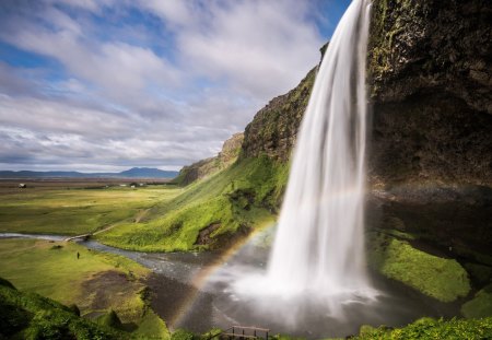 Waterfall - beauty, sky, peaceful, water, mountains, waterfall, fall, view, river, clouds, green, grass, bridge, rainbow, landscape, waterfalls, lovely, nature, beautiful, splendor