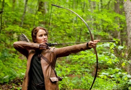 Katniss Everdeen - trees, people, archer, entertainment, celebrity, katniss everdeen, forests, nature, the hunger games, green, jennifer lawrence, movies, actresses