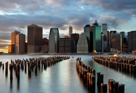 manhattan from brooklyn - city, bay, clouds, pylons