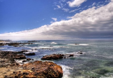 Rocky Beach - warm, clouds, water, blue, beach, rock, ocean, daylight, sand, white, nature, day, sky, line