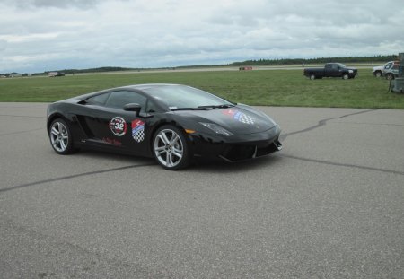 Lamborghini Gallardo on the race track - black, car, lamborghini gallardo, red