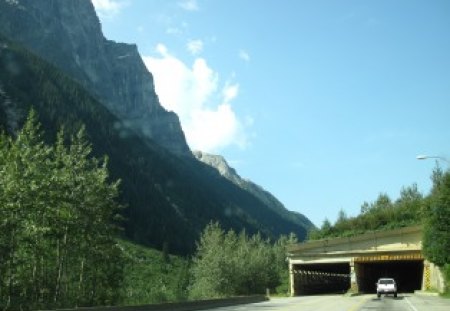 Driving through the tunnel - sky, trees, truck, mountains, tunnel, road, car, clouds, blue, green