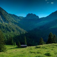 a cabin in a beautiful valley in bavaria