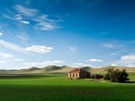 stone farmhouse in a rural australian plain