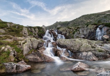 flowing waters in the french pyranes - strea, grass, mountain, stones, sky