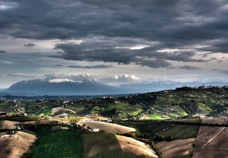 land before the mountain abruzzo italy - farms, mountains, fields, clouds