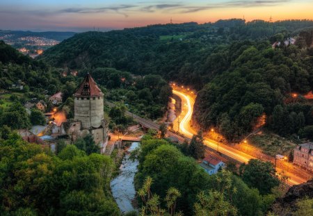 Peaceful Place - town, evening, splendor, landscape, city lights, night, forest, light, leaves, medieval, view, sky, woods, castle, clouds, trees, beautiful, road, city, beauty, lovely, architecture, buildings, tree, nature, sunset, peaceful, bridge, building