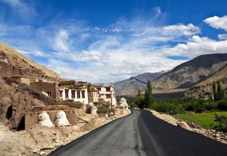 ancient civilization modern road - trees, road, mountains, sky, ruins