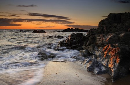 Beautiful Sunset - rocks, beautiful, beach, ocean, view, ocean waves, nature, sunset, beauty, peaceful, sky, sand, sunlight, clouds, lovely, splendor, sea, waves