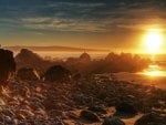 sunset on a rocky rocky beach