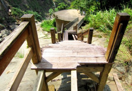 The damaged plank road - steep, leading to the waterfall, the damaged plank road, mountain