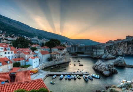 Beautiful Place - croatia, boat, pier, sunset, mountains, landscape, bay, peaceful, dubrovnik, sunlight, clouds, lovely, sailing, rocks, sunbeams, beautiful, amazing, ocean, architecture, view, nature, sailboat, rays, beauty, sailboats, sky, sunrays, town, houses, splendor, house, sea, boats