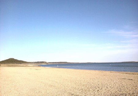 The Beach - daytime, sky, rocks, water, hills