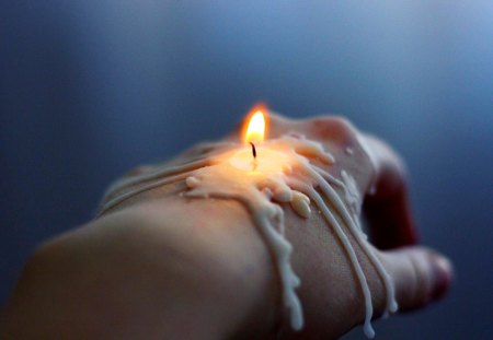 CANDLE LIGHT - candle, hand, wax, wick, fire, brush