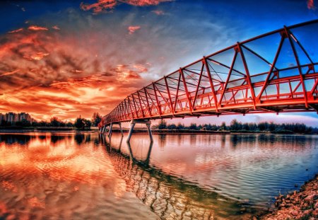 Beautiful bridge over the river - pretty, calm, summer, town, reflection, riverbank, red, nice, sky, clouds, beautiful, city, colors, lovely, orange, dazzling, glow, colorful, river, nature, bright, bridge