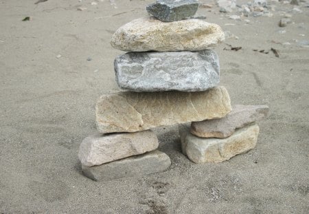 Symbol on the shore of the lake in BC , Canada - symbol, grey, beige, photography, sand, stones