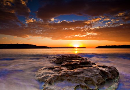 Sunset - beautiful, amazing, ocean, view, nature, sunset, water, rays, beauty, sun, peaceful, lake, sky, sunrays, reflection, sunlight, clouds, lovely, splendor, sea, colors