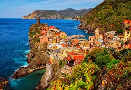 Town on the rocks - pretty, summer, horizons, town, coast, roofs, beach, leaves, mountain, shore, view, nice, houses, greenery, water, beautiful, sea, lovely, ocean, village, nature, rocks