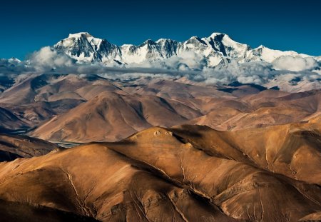 barren hills to majestic mountains - clouds, barren, mountains, hiils