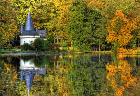 Autumn Reflection - cottage, riverbank, colorful, tower, reflections, view, reflection, river, lake, landscape, falling, nature, woods, forest, beautiful, leaves, cabin, nice, lakeshore, beauty, autumn, sky, trees, peaceful, water, autumn leaves, foliage, fall, pretty, clouds, house, tree, houses, shore, lovely, autumn splendor, autumn colors, splendor, colors