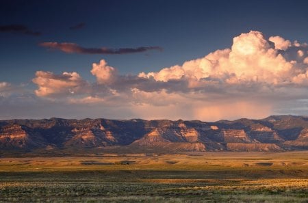 landscape in utah - plains, mountains, grass, clouds