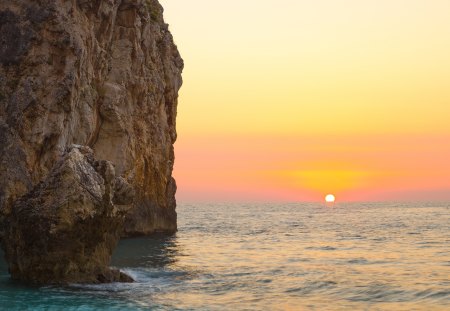 Mediterranean Sun - rocks, beautiful, lefkada, view, ocean waves, nature, sunset, greece, beauty, sun, peaceful, sky, sunlight, clouds, lovely, splendor, sea, waves