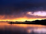 sunset behind rain clouds