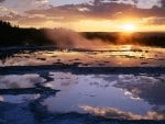 sunset at the great fountain geyser in yellowstone