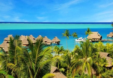 Tropical seascape - beach, sky, tropics, sailboats, water, bungalows, vacation, view, clouds, relax, ocean, seascape, palms, tropical, summer, huts, exotic, nature, blue, rest, sea