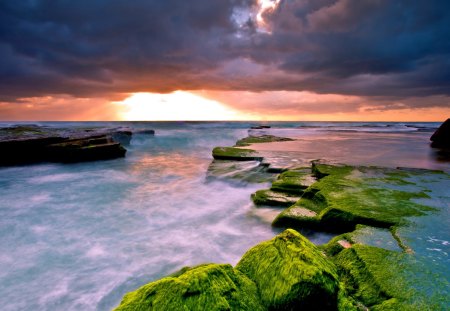 The Storm - rocks, beautiful, amazing, ocean, seascape, view, ocean waves, nature, sunset, stormy, rays, beauty, peaceful, sky, sunrays, storm, sunlight, clouds, lovely, splendor, sea, colors, waves