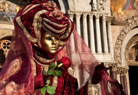 Masked Beauty - beauty, roses, mask, italy, venice, masked, rose, carnival, pretty, carnival mask, hand, romance, red roses, hands, lovely, italia, romantic, red, beautiful, flowers, red rose