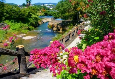 Lovely place - stairs, sky, trees, riverbank, stream, garnes, greenery, rocks, view, river, clouds, bridge, park, summer, buildings, nature, town, red, blue, pink, steps, stones, flowers